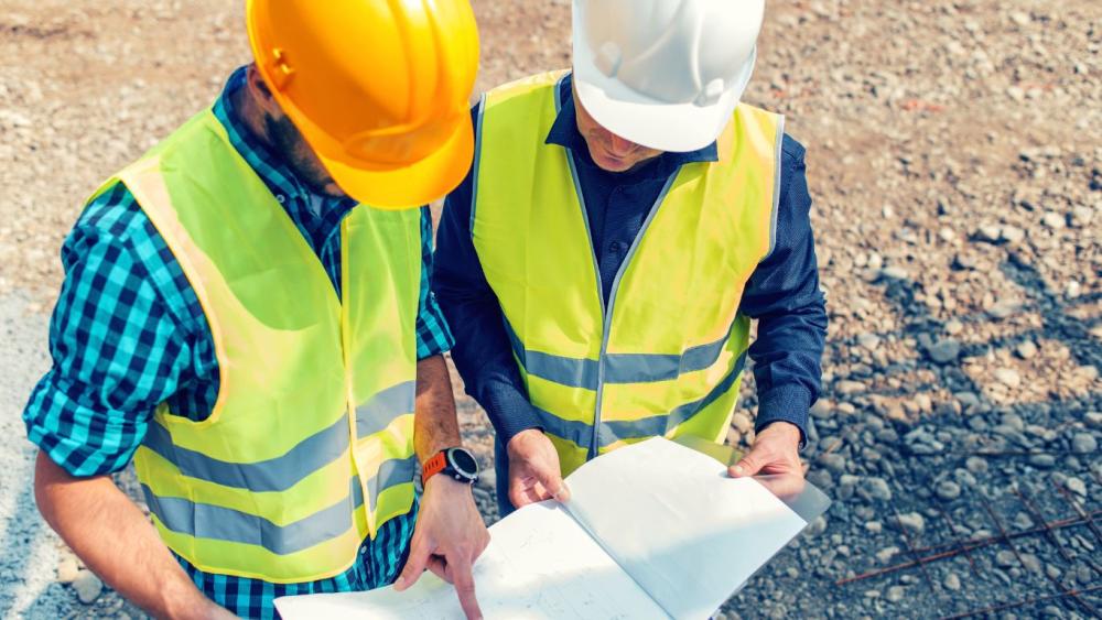 People in hard hats on a construction site